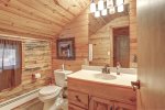 Black Bear Lodge Bathroom with tub/shower combo.